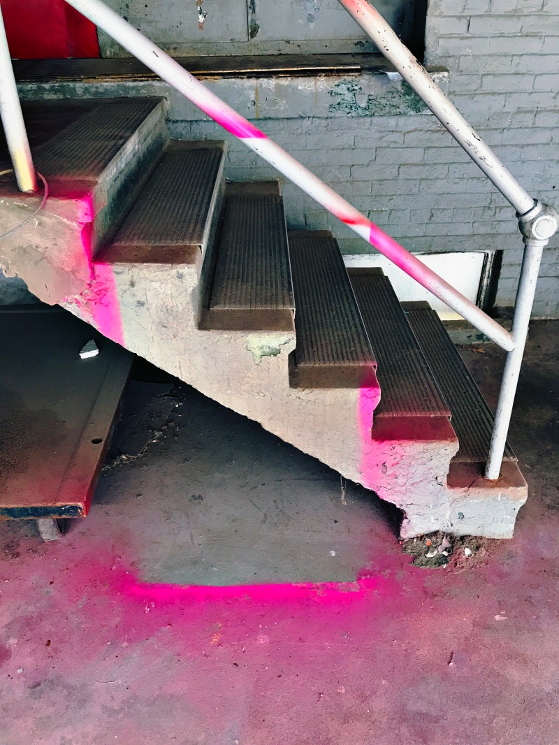 A perimeter stain / where some thing was painted pink / then quickly removed. // micropoetry - haiku - haikumages